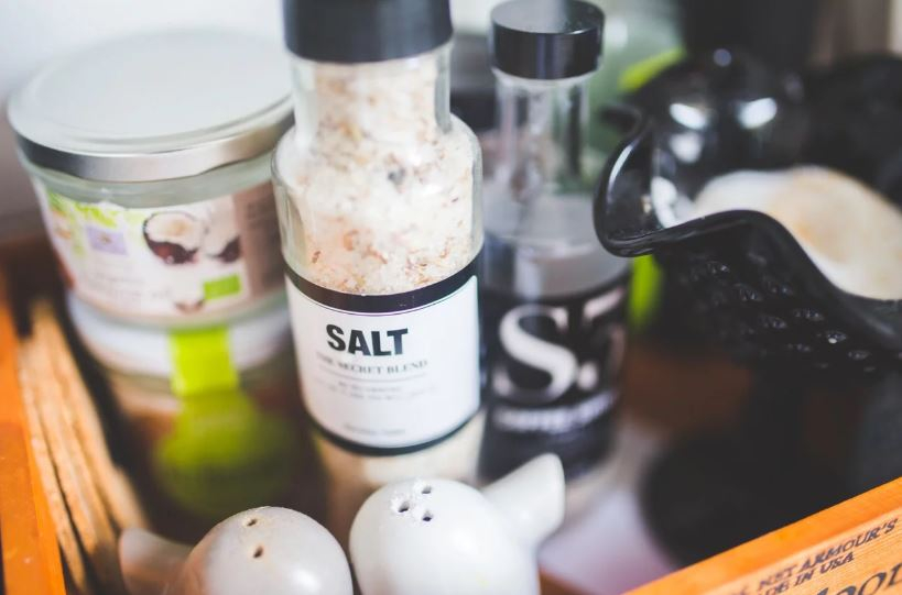 Salt and other seasonings on a counter